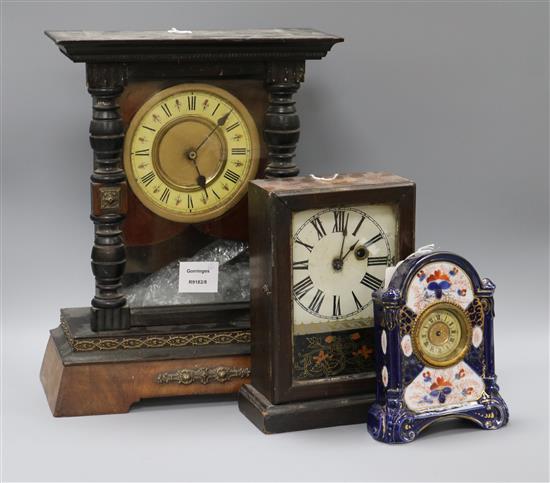 A late 19th century German eight day mantel timepiece in an ebonised and walnut case and two other small timepieces (3) tallest 36.5cm